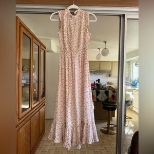 Doen flowy floral sleeveless midi dress with high neck & ruffled hems